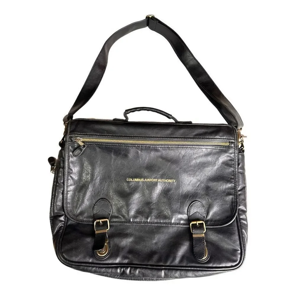 Large leather travel/work bag black with lots of pockets adjustable shoulder str
